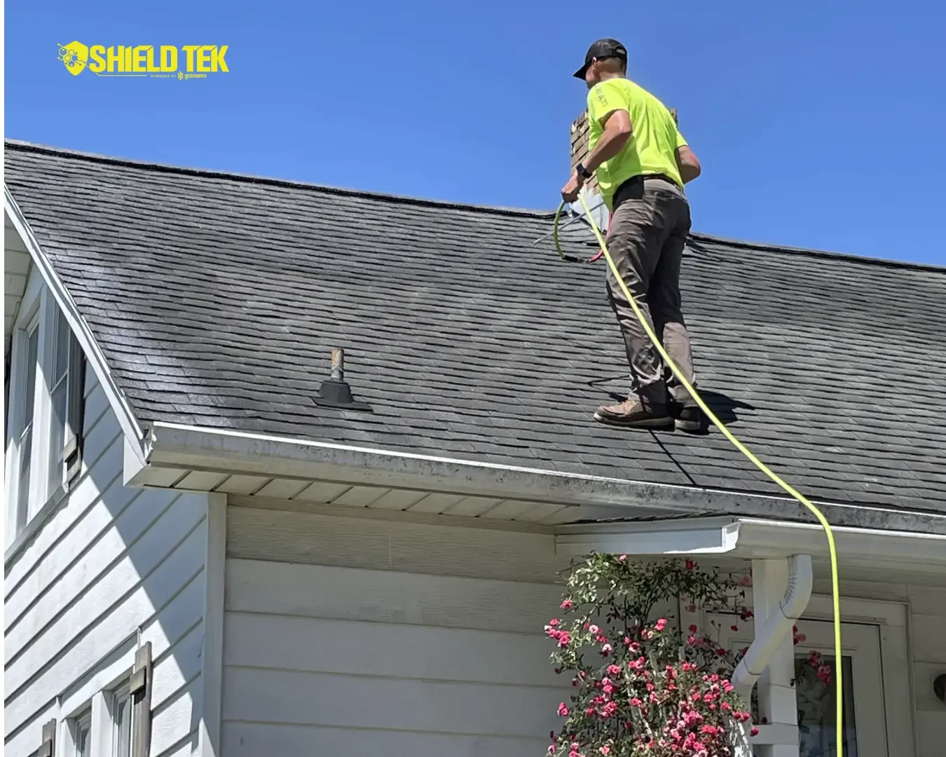 ShieldTek professional applying roof protection