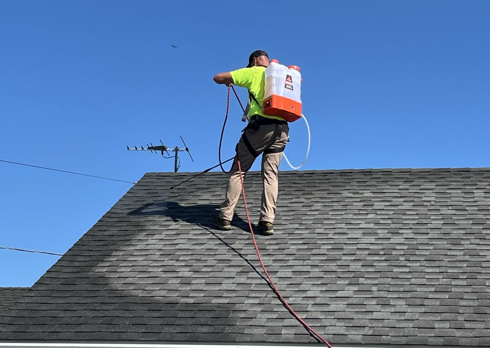 ShieldTek technician treating a roof
